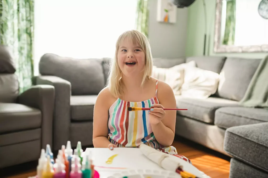 Disabled girl painting