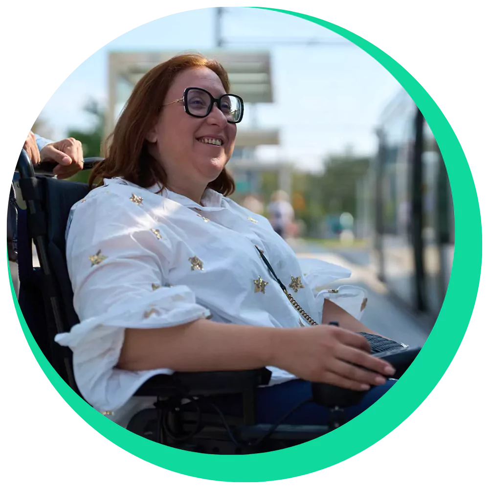 Disabled woman in wheelchair smiling